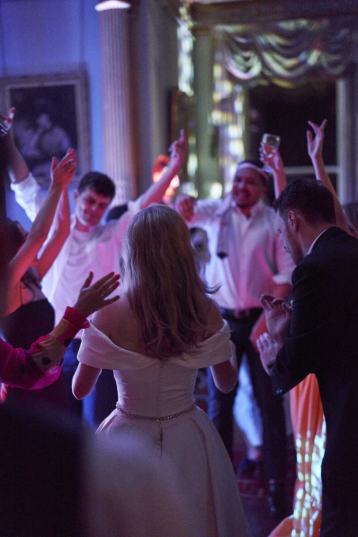 Wedding bridge and groom in front of their guests
